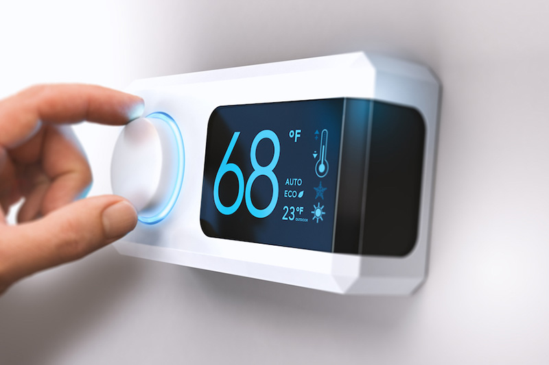 Blog Title: Artificial Intelligence and HVAC? Photo: AI Thermostat