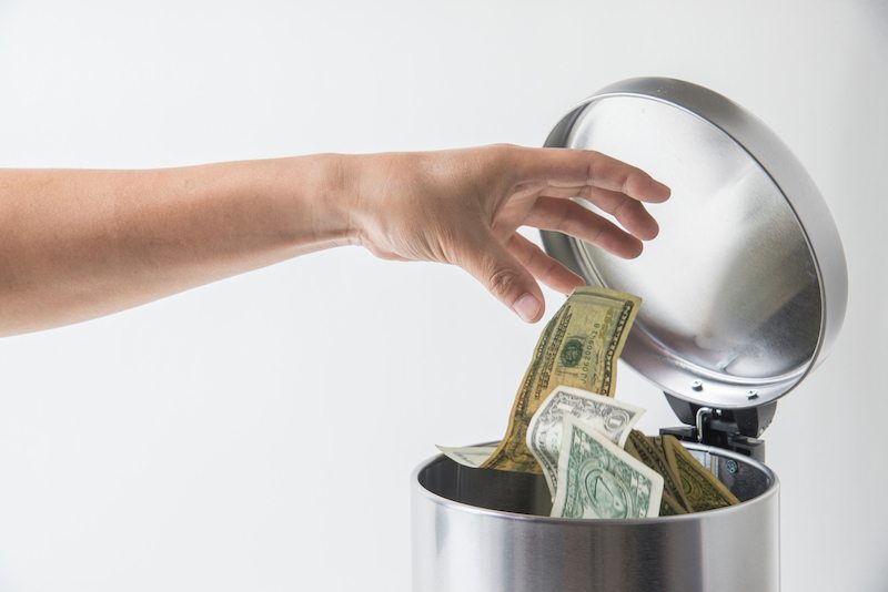 throwing away dollar in trashcan because they are unknowingly using the heat pump's electric heat.