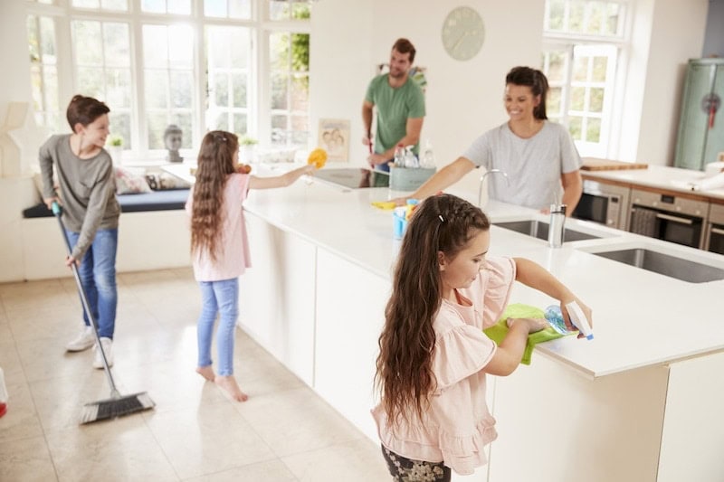 Children Helping Parents With Household Chores In Kitchen. Time for spring maintenance in Kalida